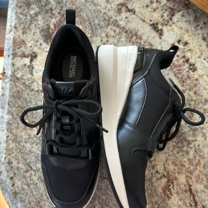 Brand new wedge Michael Kors 2 1/4 inch heel.